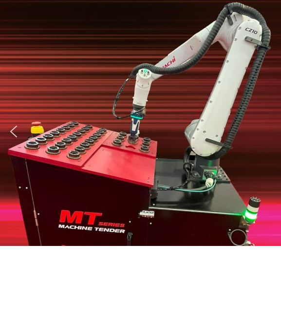 a robot work cell where the robot obtains parts from a work cell for machine tending. 